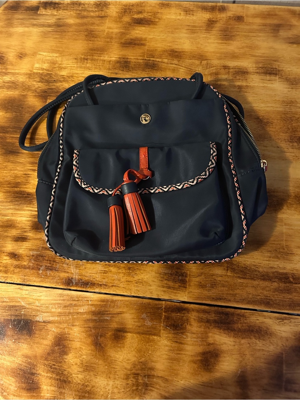 Spartina 449 Navy Crossbody Bag with Orange Tassel Accent